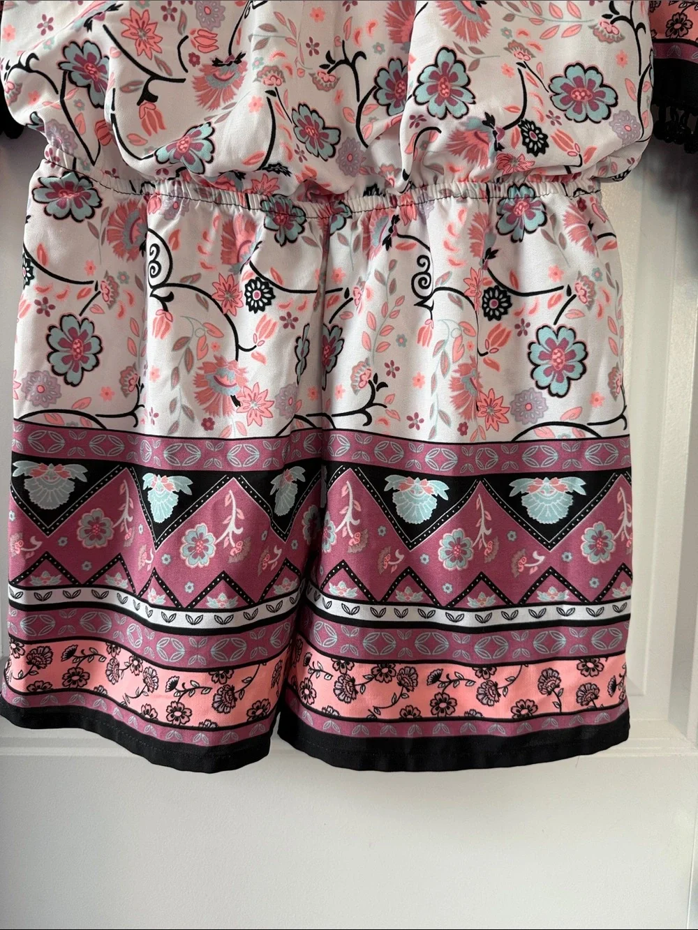 Gently worn Girls Floral Tassel Romper